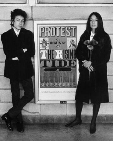 Daniel Kramer, Bob Dylan and Joan Baez with Protest Sign, Newark Airport, NJ, 1964